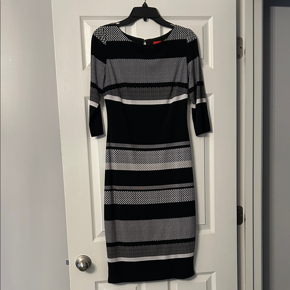 Melrose Elegant Black and Gray Striped Dress. Only worn a few time, size 6